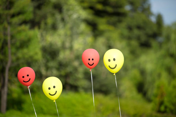 istock red and yellow colored balloons. 1125268522