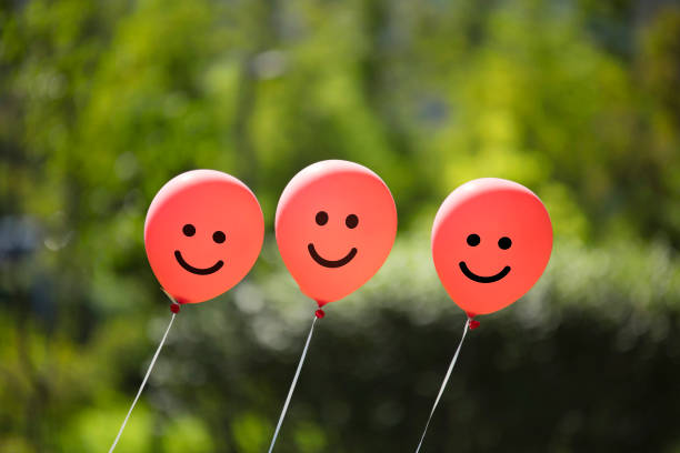 istock red balloons swaying in wind. 1125268615