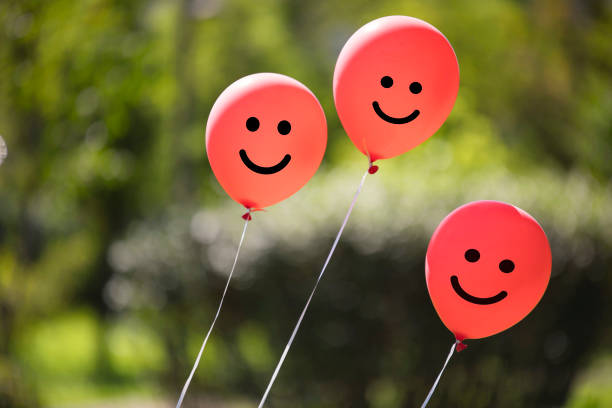 istock red colored air balloons floating in the forest 1125268617