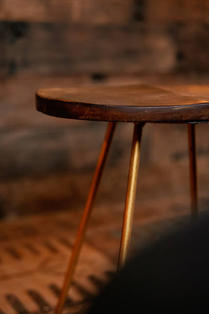 istock Rustic wood and bronze metal bar stool 1125271271