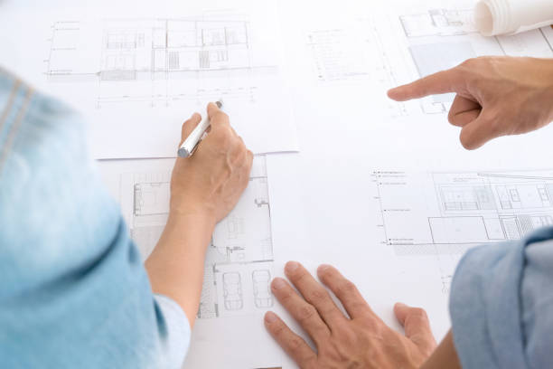 istock Image of engineer teamwork meeting for architectural project at a workplace 1125272733