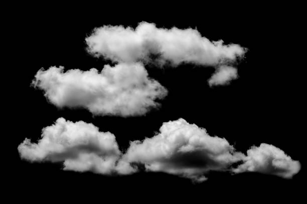 istock White fluffy clouds in the black sky background 1125273216