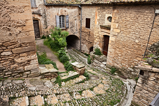 Gordes, Vaucluse, Provence, France: ancient alley in the old town of the village perched on the top of a mountain