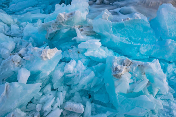 istock Ice frozen breaking close up background 1125277492