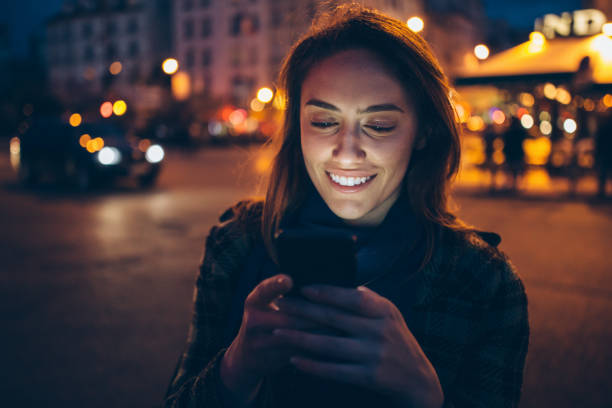 istock Woman texting at night 1125281520