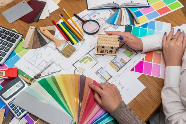 istock Teamwork of creative designers working with colour palette 1125283796