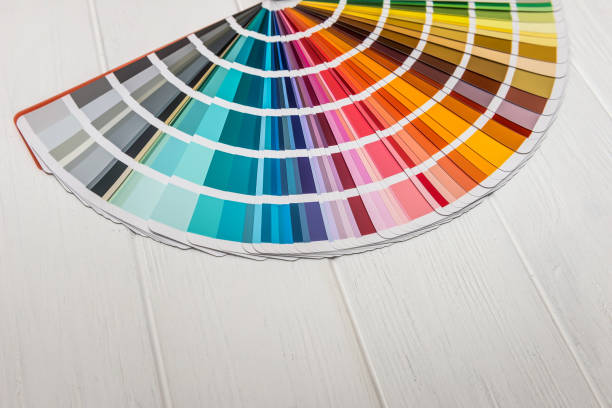 istock Different colour sampler on wooden background closeup 1125285329