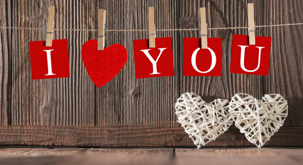 istock Pegs and I LOVE YOU words on rope 1125285394