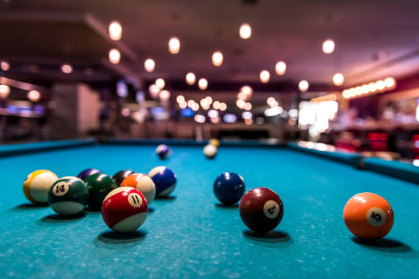 istock Colorful billiard balls on playing table, dispersed 1125285649