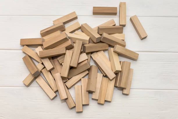 istock Wooden blocks for tower building on the desk 1125285768