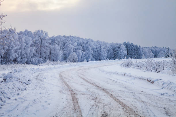 istock Country road after a snowfall. 1125288362