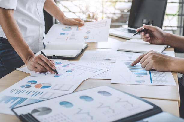 istock Business team meeting working with new startup project, discussion and analysis data the charts and graphs, laptop using, Business finances and accounting concept 1125288475