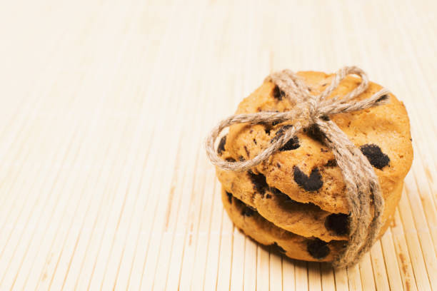 istock Baked chocolate chip cookies on rustic wooden table 1125296892