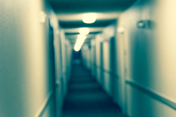 istock Filtered image blurry background hallway in typical American hotel 1125301655