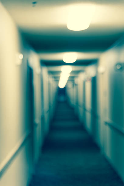 istock Filtered image blurry background hallway in typical American hotel 1125301684