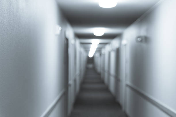 istock Filtered image blurry background hallway in typical American hotel 1125301734