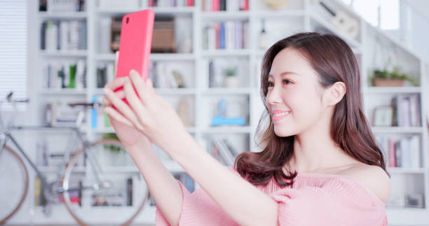 Young asian woman take selfie