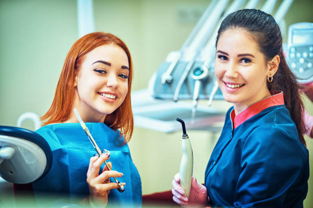 istock Dentist examining a patient's teeth in the dentist. 1125303622