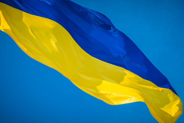 istock Ukrainian flag on sky background 1125305566