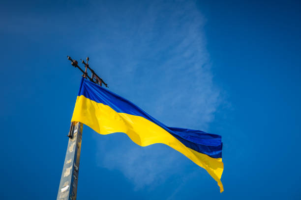 istock Ukrainian flag on sky background 1125305760