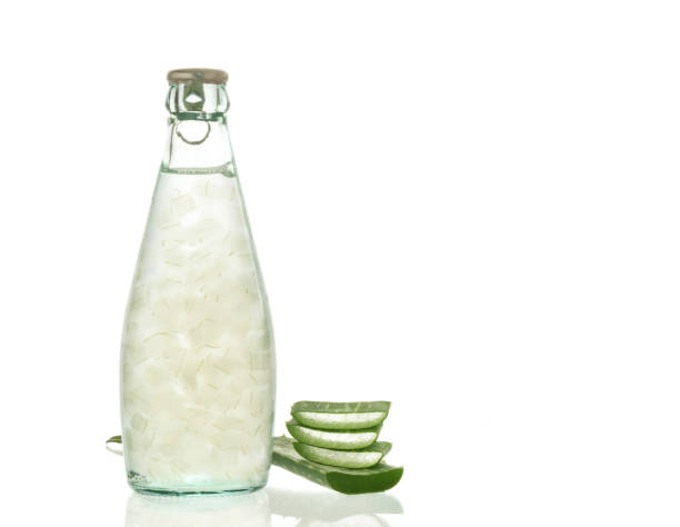 Aloe vera Aloe vera juice isolated on white background. Can help neutralize free radicals Contributes to aging. And help strengthen the immune system as well. aloe juice stock pictures, royalty-free photos & images