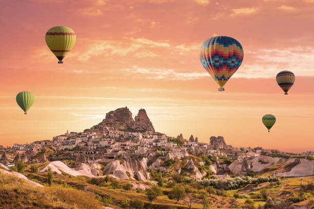 colorful hot air balloons over valley cappadocia - cappadocia hot air balloon turkey basket imagens e fotografias de stock