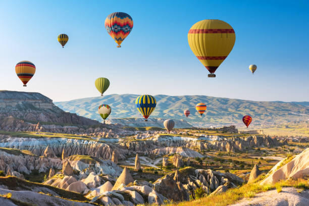 istock Hot air balloons flying over Cappadocia, Turkey 1125306072
