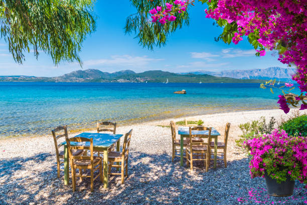 Taverna on the beach, Lefkada Taverna on Nikiana beach, Lefkada island, Greece greece stock pictures, royalty-free photos & images