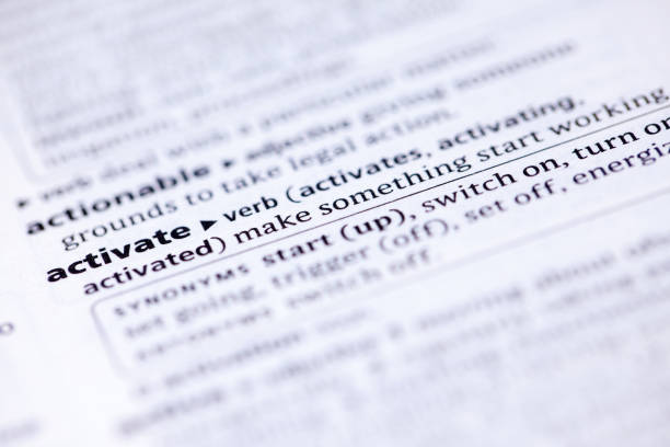 istock Close up to the dictionary definition of word Activate 1125314362
