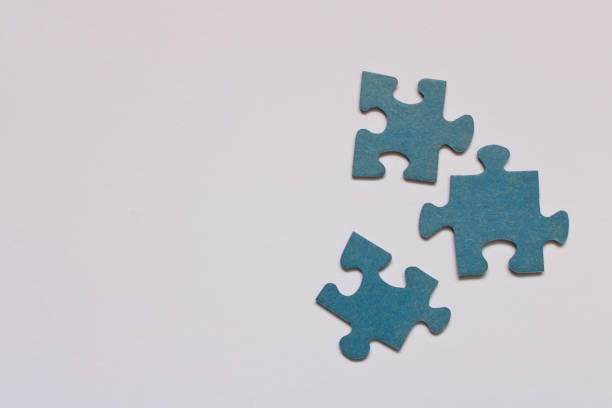 istock Several pieces of puzzles . Isolated on white background 1125317598