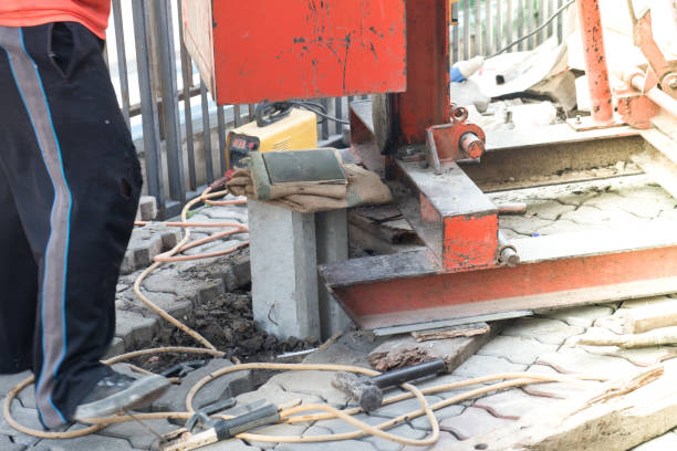 istock Pile driving of hydraulic drilling machines on construction site (Home renovation) 1125318184
