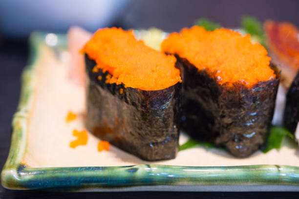 Sushi with shrimp roe or flying fish roe Japanese name is ebiko sushi set