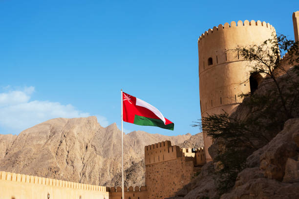 Tower and flag of Nahkal Fort (Oman)
