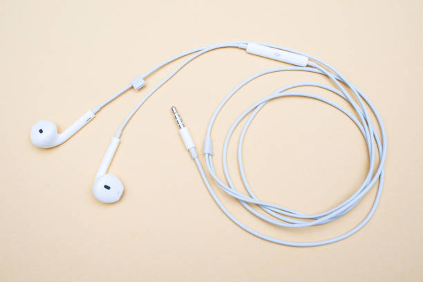istock white earphone for use with smartphone 1125327531