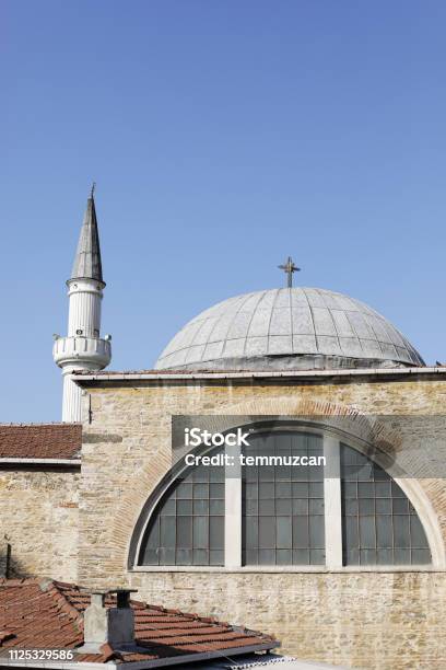 Kuzguncuk Mosque And Surp Krikor Lusavoric Church Istanbul Turkey Stock Photo - Download Image Now