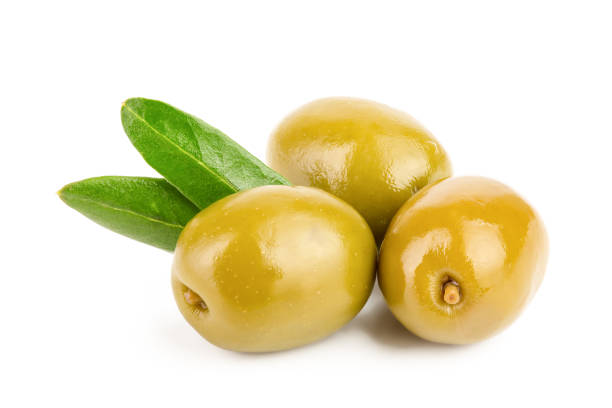 istock Green olives with leaves isolated on a white background 1125335441