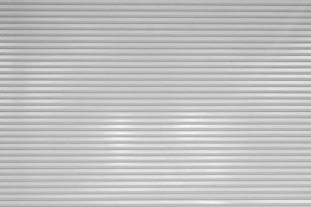 istock corrugated metal sheet,white Slide door ,roller shutter texture 1125341425