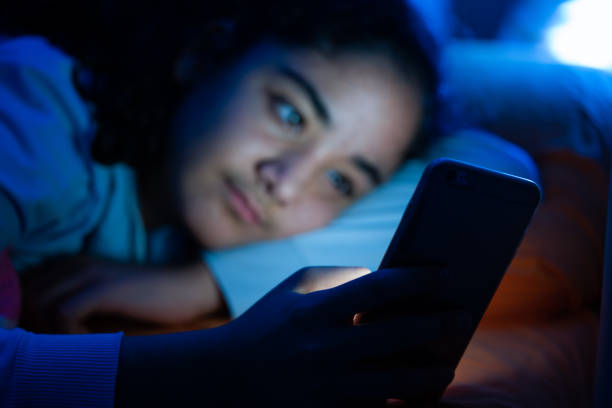 istock smartphone, sleep, sleepless and young girl 1125343611