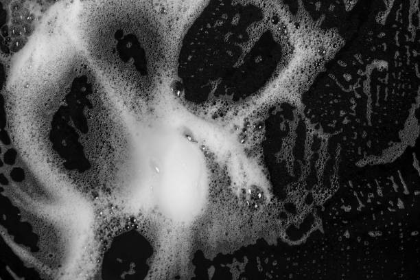 istock Abstract background white soapy foam texture. Shampoo foam with bubbles 1125344605
