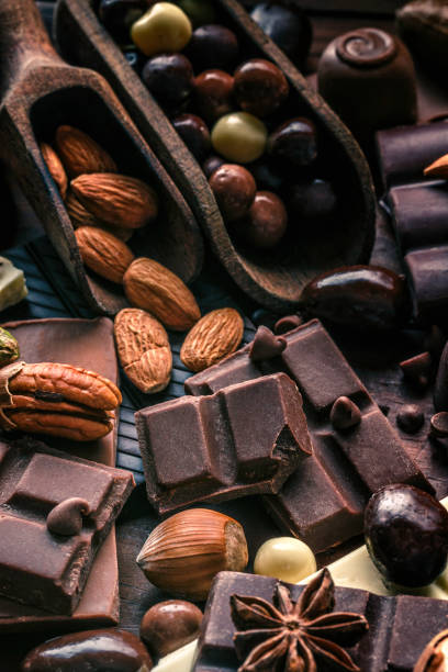istock Assorted chocolate, nuts and dried fruit in old fashioned style 1125346883