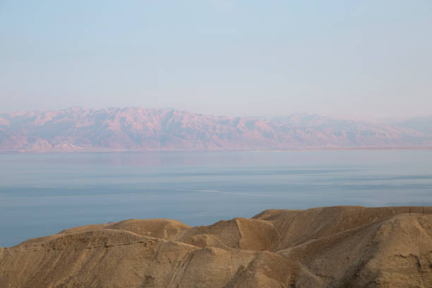 Panoramic view of Dead Sea,  Israeli site. View from the hill above of west bank to the east. Over the sea is the coast of Jordan