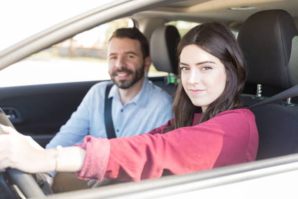 istock Attractive Driver On Road Trip With Boyfriend 1125349911