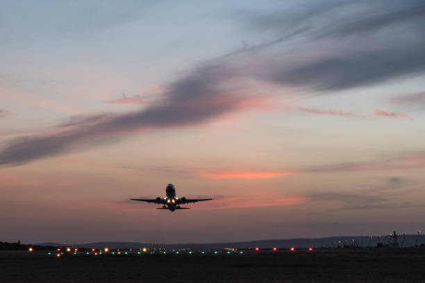 istock Take-off plane in the evening from the airport. 1125351613