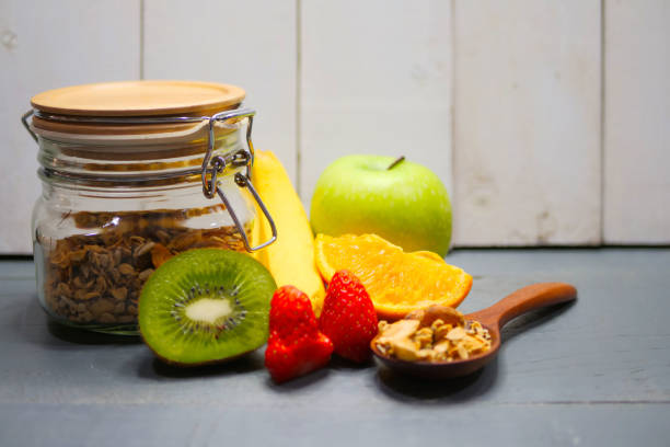 istock Yogurt parfait with granola and fresh fruit, healthy breakfast concept 1125352411