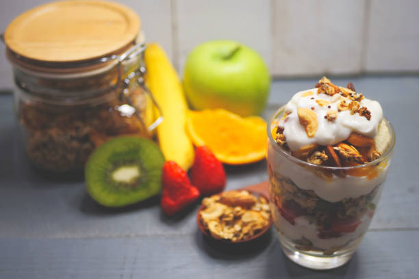 istock Yogurt parfait with granola and fresh fruit, healthy breakfast concept 1125352416