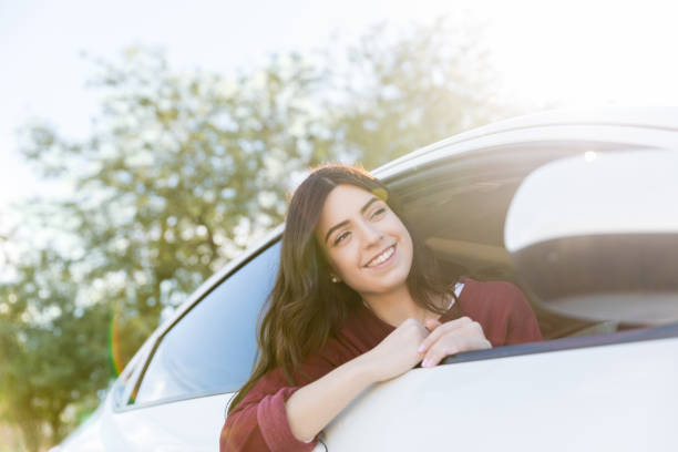 istock Woman Enjoying Road Trip On Sunny Day 1125353575