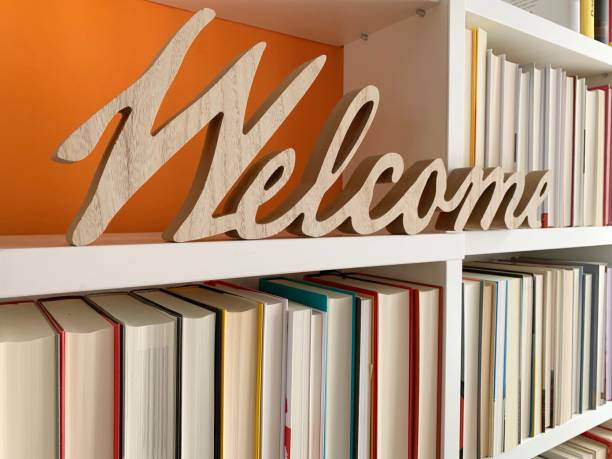 word welcome on books shelf - library book shelf generic imagens e fotografias de stock