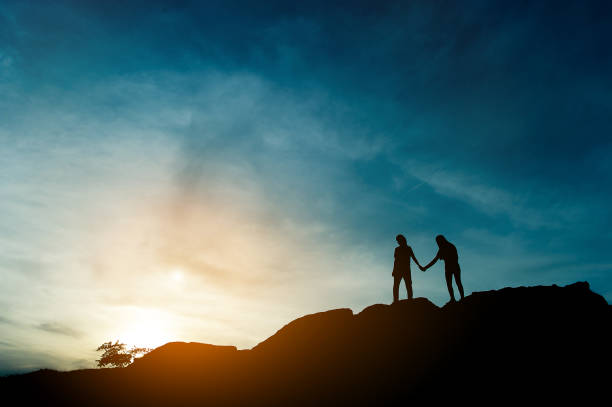 istock Silhouette of team leadership, teamwork and teamwork and delightful silhouette concepts 1125359720