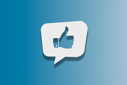 Speech bubble on blue background, Thumbs Up