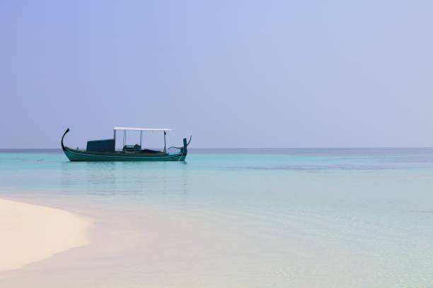 Isolated traditional maldivian boat called \
